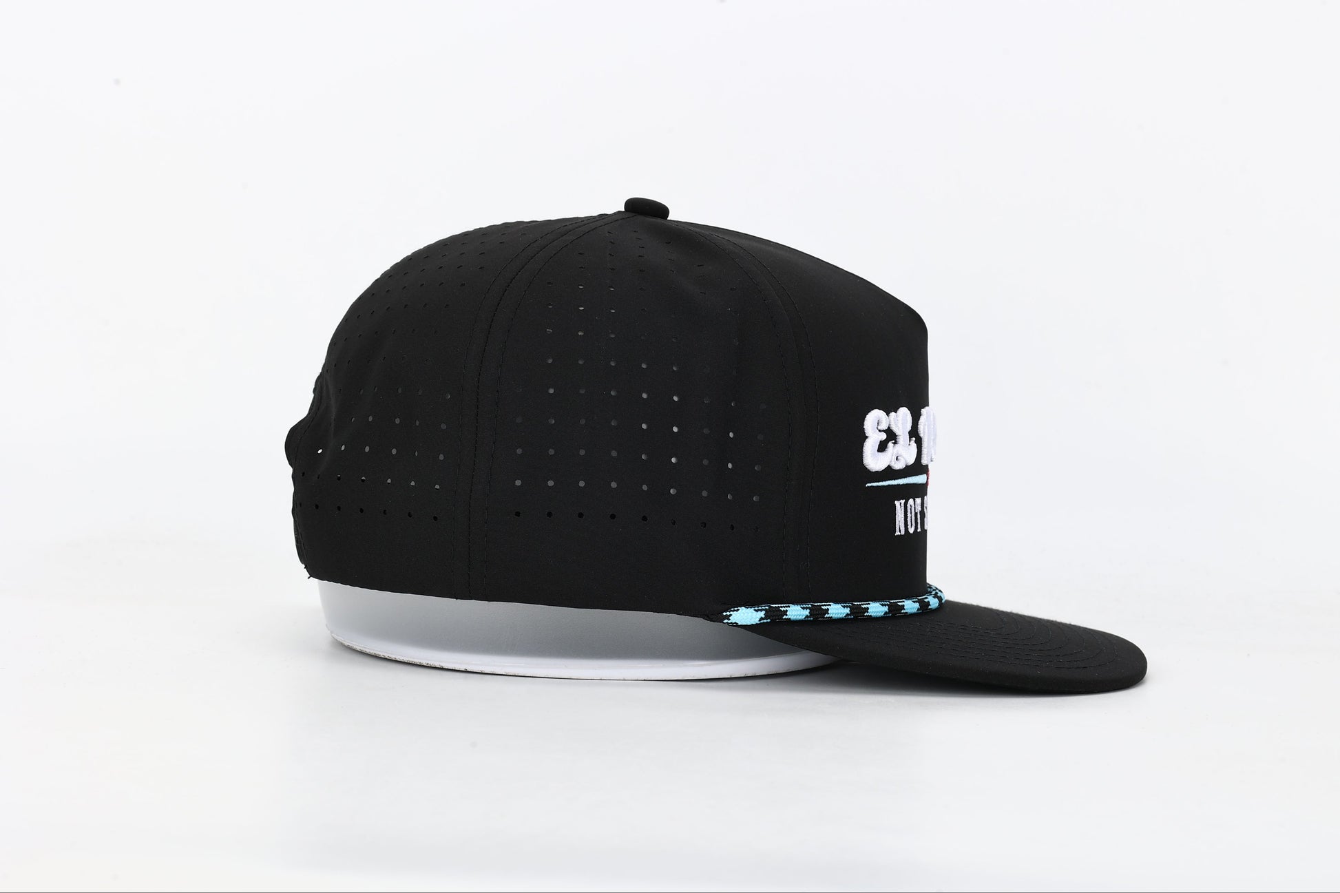 Black snapback hat with 'El Rancho Not So Grande' white, blue and pink embroidery on the front. Left Side View