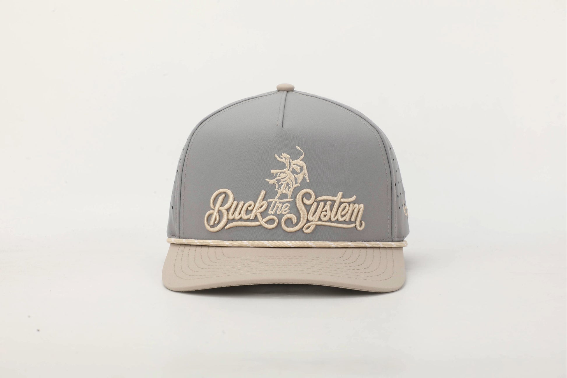 Gray and Beige cap with 'Buck the System' logo in Old Gold embroidery, Front View.