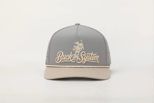 Gray and Beige cap with 'Buck the System' logo in Old Gold embroidery, Front View.