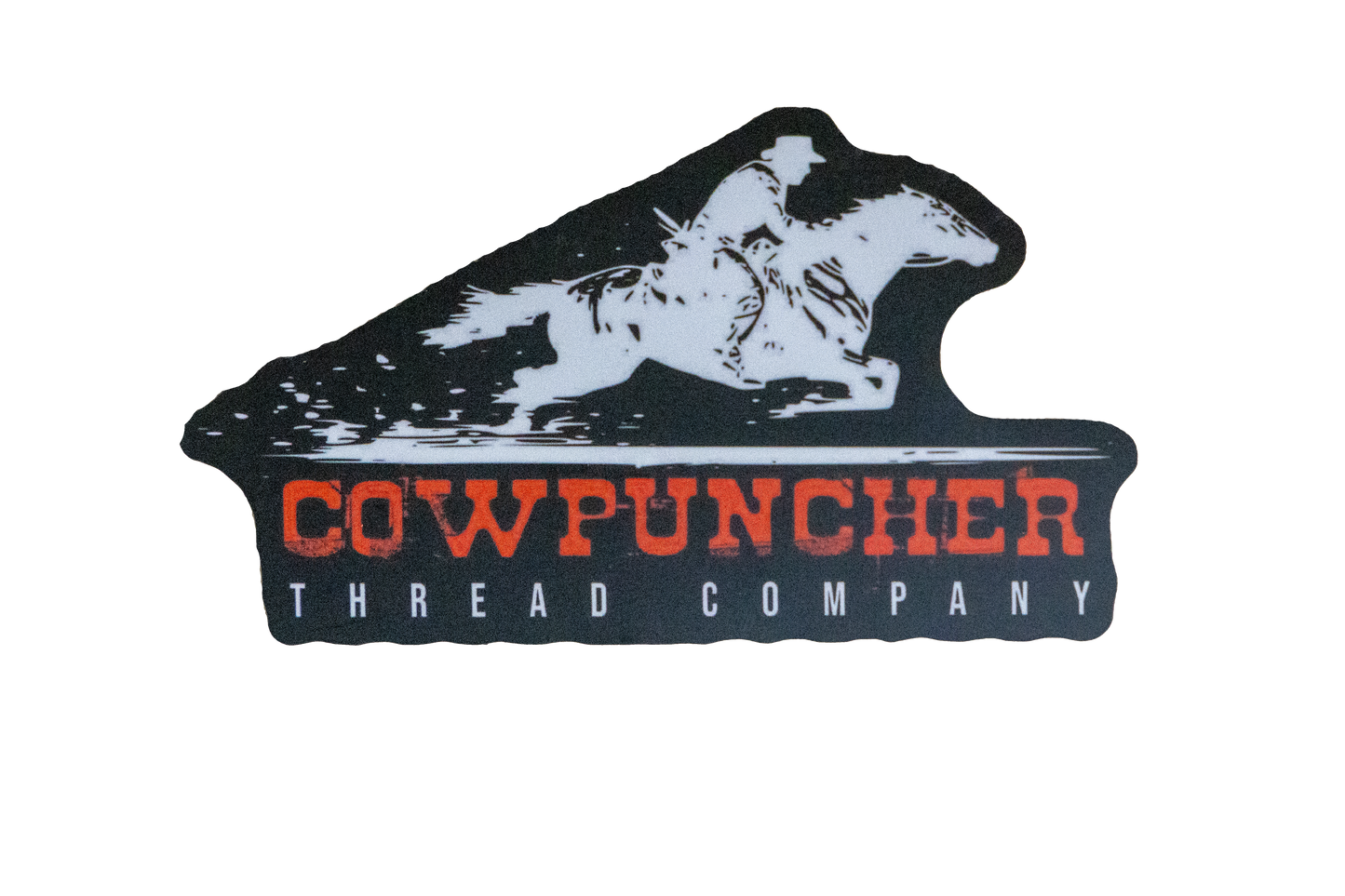 Sticker of a white horse and rider design above the text 'Cowpuncher Thread Company' in red, on black background.