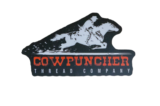 Sticker of a white horse and rider design above the text 'Cowpuncher Thread Company' in red, on black background.