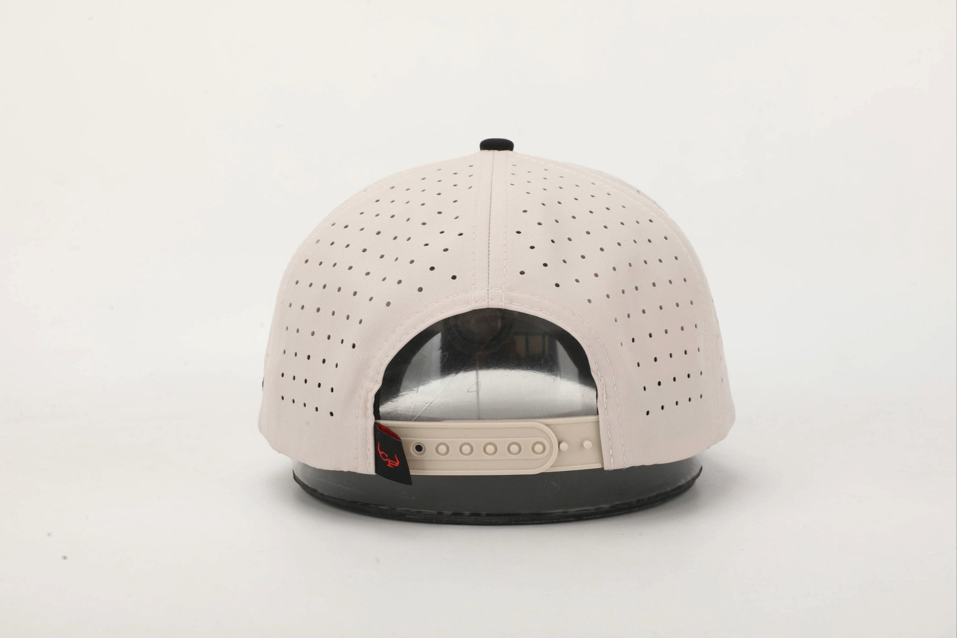 Beige and Black cap with 'Rank & Reckless' logo on the front with a Black and Red rope. Back View.