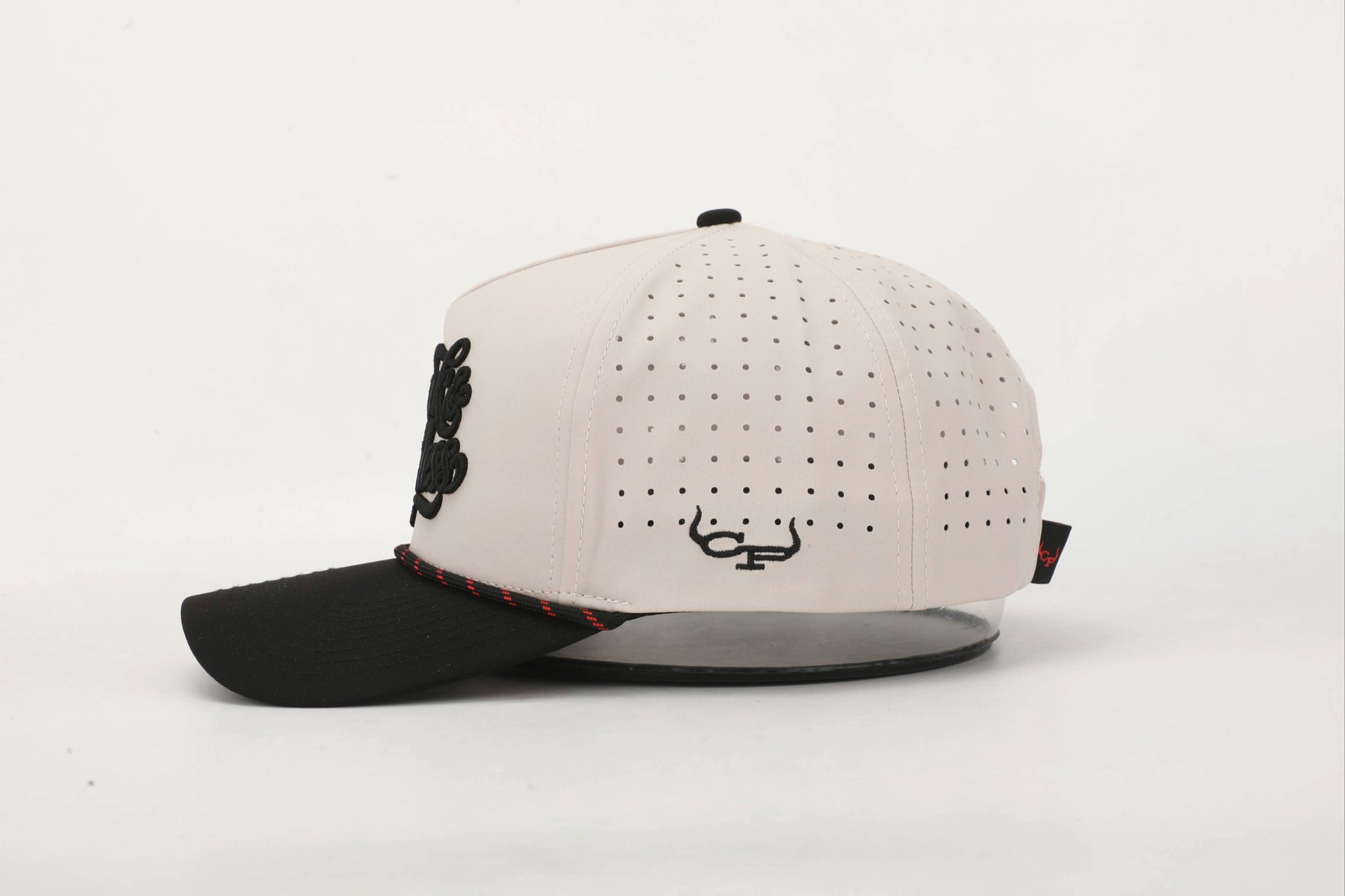 Beige and Black cap with 'Rank & Reckless' logo on the front with a Black and Red rope. Right Side View.