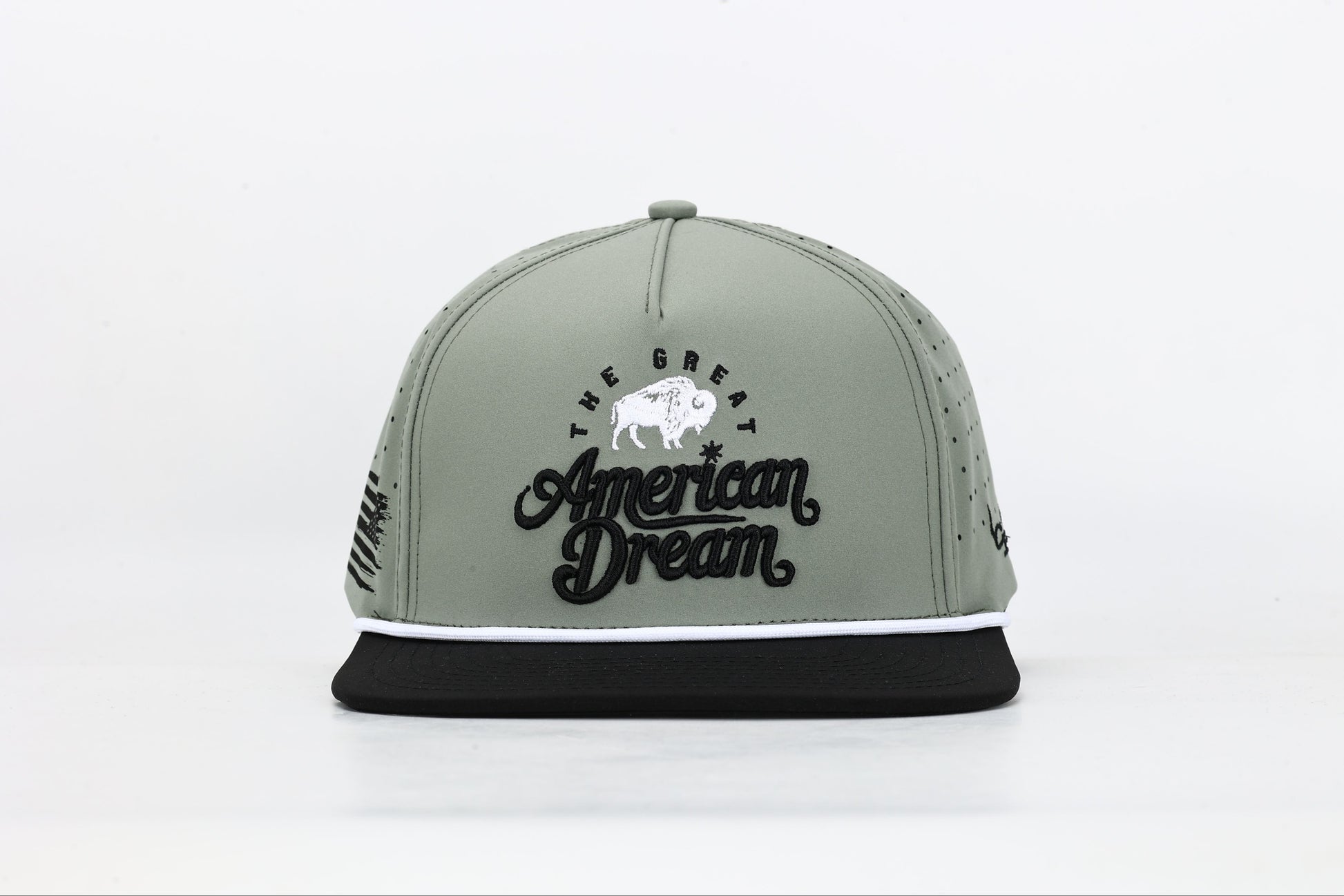 Olive green and black snapback cap with "The Great American Dream" embroidered on the front in black and white, featuring a white buffalo design. Front View