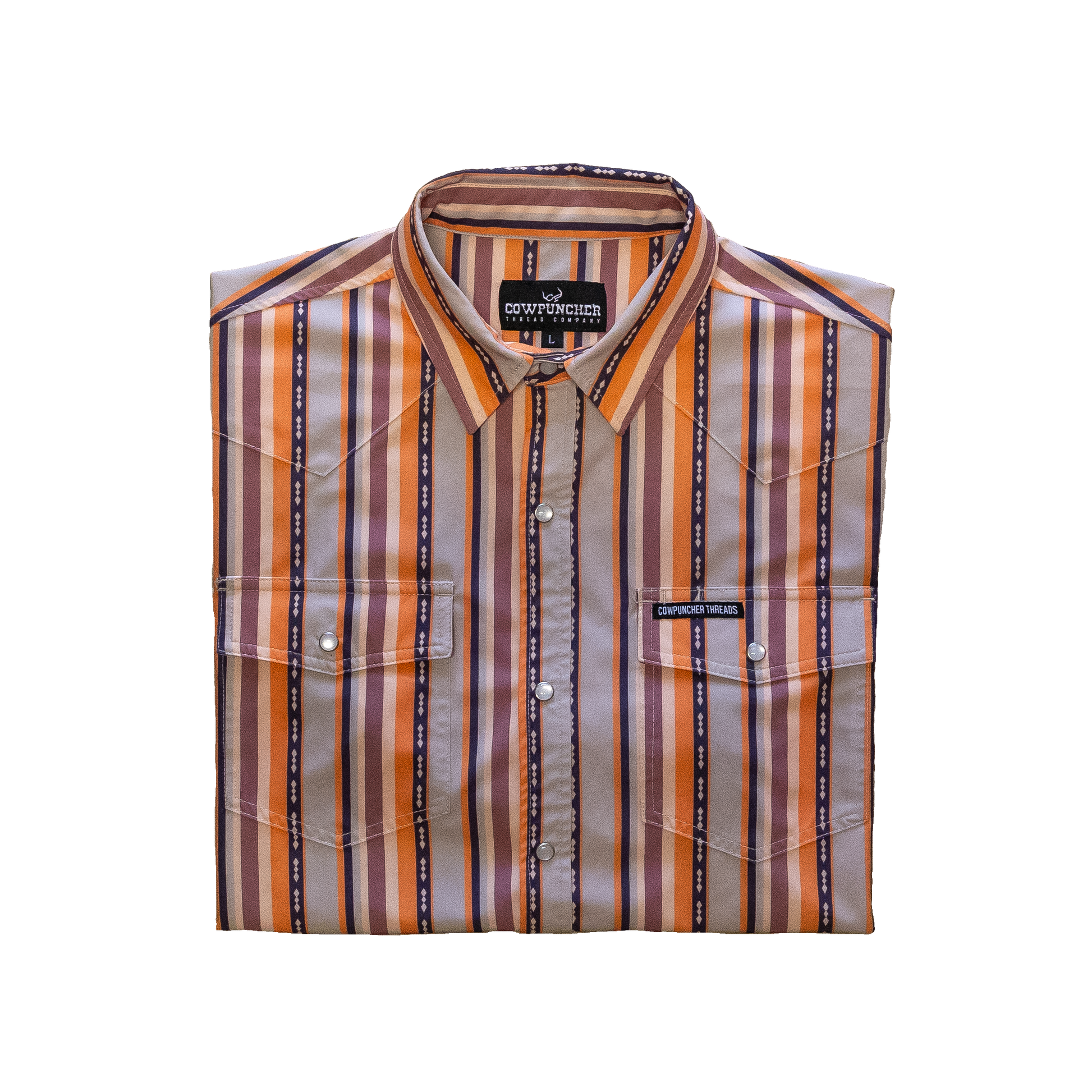 Folded classic brushpopper style pearlsnap shirt on a transparent background