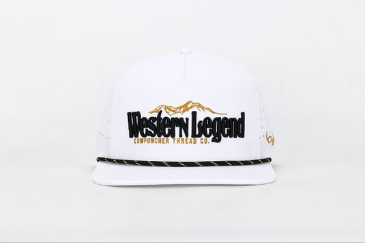 White snapback cap with "Western Legend Cowpuncher Thread Co." embroidered on the front in black and gold, featuring a gold mountain design and a black rope with gold accents above the brim. Front View